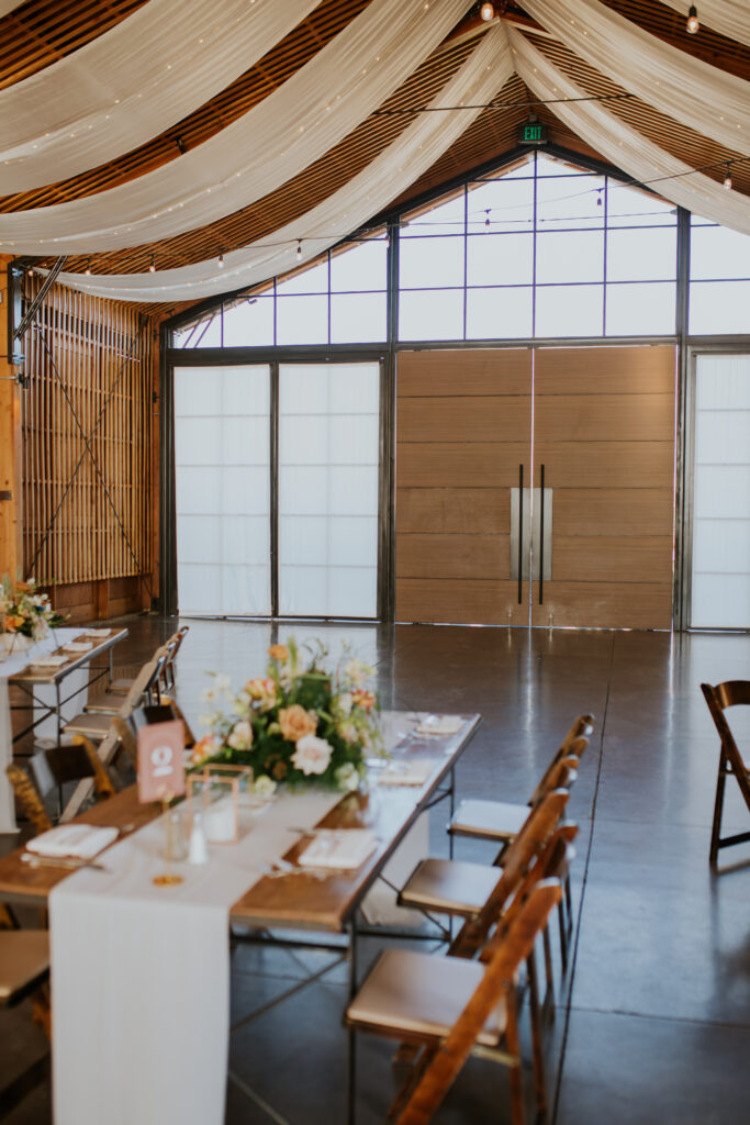 A look at the beautiful place settings and indoor space at The Paseo wedding venue in Apache Junction, Arizona. #ChelseyMichelleCoPhotography #Arizonaweddingphotographer #Phoenixweddingphotographer #Apachejunctionwedding #ThePaseo #weddingatThePaseo #Gilbertphotographer #Arizonadestinationwedding