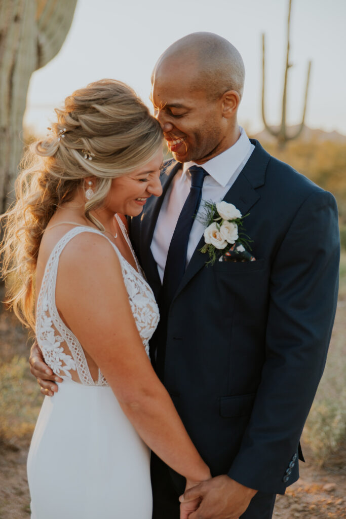 Close-up of the bride and groom dancing in the stunning Arizona desert where they got married earlier that day. #ChelseyMichelleCoPhotography #Arizonaweddingphotographer #Phoenixweddingphotographer #Apachejunctionwedding #ThePaseo #weddingatThePaseo #Gilbertphotographer #Arizonadestinationwedding