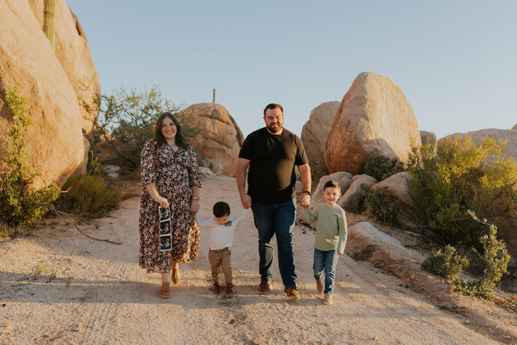 The Phoenix property the Boulders is amazing because it has lots of space for littles to play. The two little boys just wanted to explore, and they had the freedom to do that here. Arizona family photoshoots. #ChelseyMichelleCoPhotography #MaternityPhotos #EastValleyAZ #familyphotos
