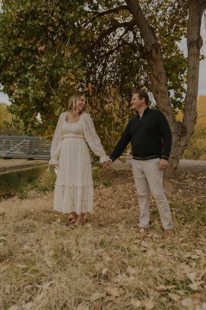 The happy couple gaze at each other during an engagement session with Chelsey Michelle, beautiful engagements that capture the couple’s love. Unique wedding gilbert mesa arizona #engagementphotosgilbert #azbrides #couplephotography #arizonaweddings #cayleenlyonsphotography 
